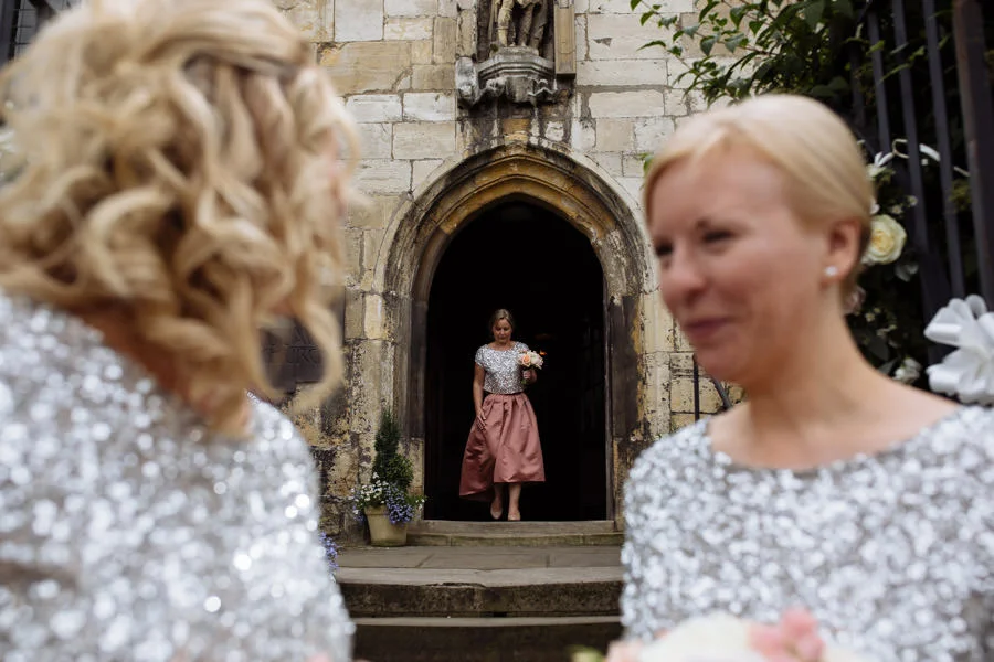 Bridesmaids at St Olave's Church, York. Modern wedding photograp bridesmaids at st olave s church york modern wedding photographer