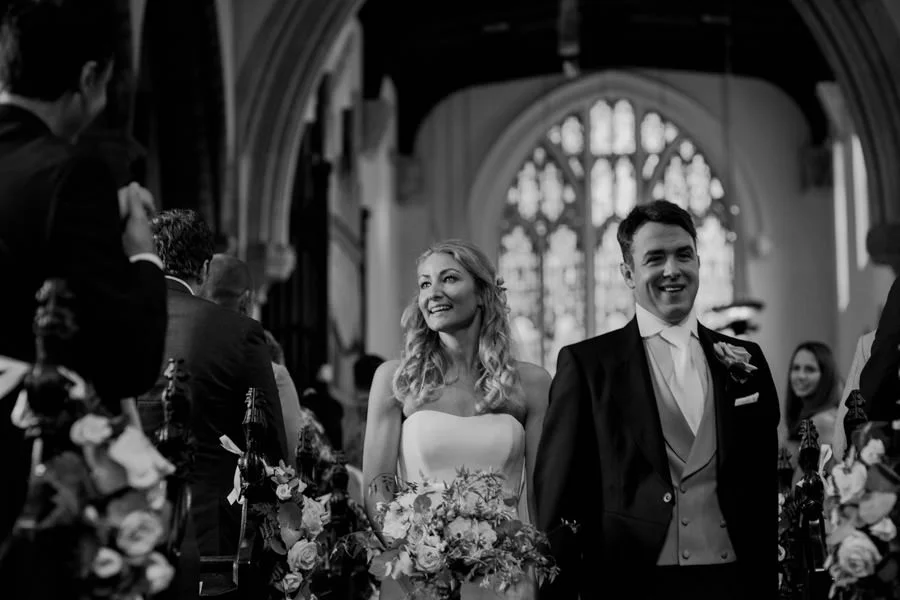 Bride and groom walking down the aisle of St Olave's Church, Yor bride and groom walking down the aisle of st olave s church york