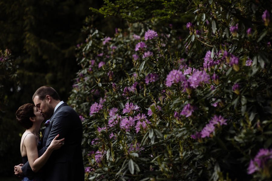 bride and groom kissing creative wedding photographer leeds