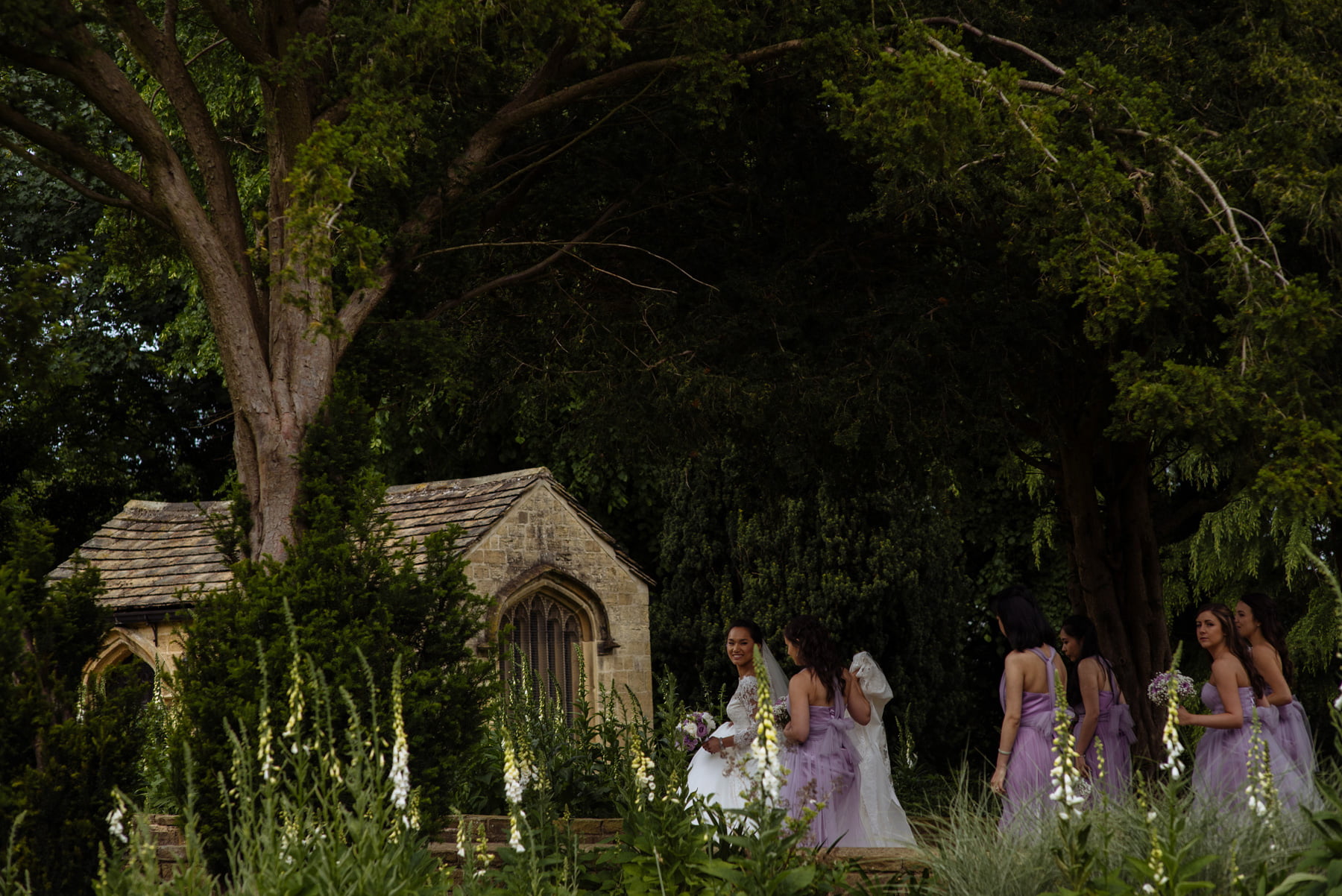 bride with bridesmaids at the chapel bowcliffe hall yorkshire wedding photographer