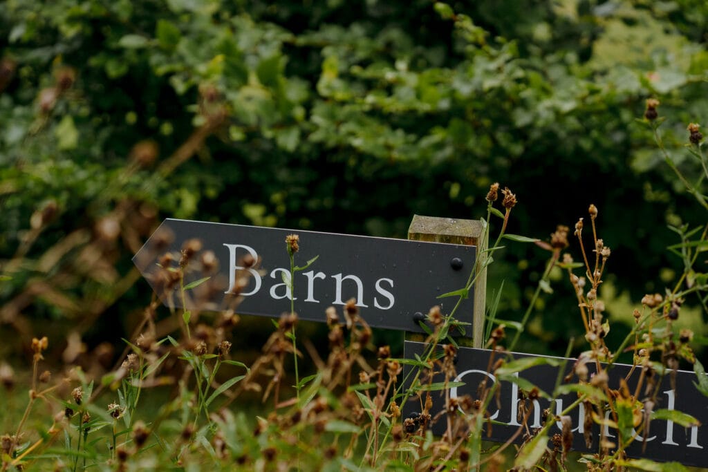 Signs at lodge farm wedding barn