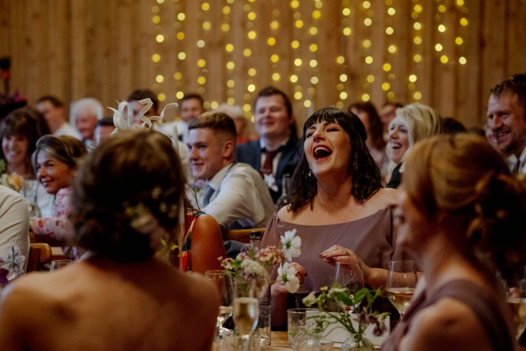 guests during speeches at lodge farm wedding venue cundall